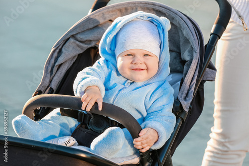 Cute funny baby in stroller...
