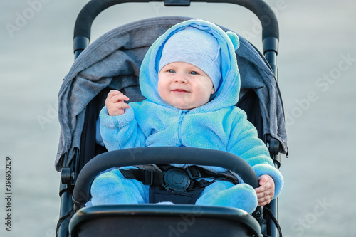 Cute funny baby in stroller...