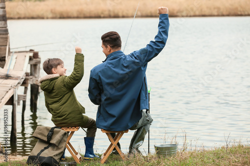 Little boy and his father f...