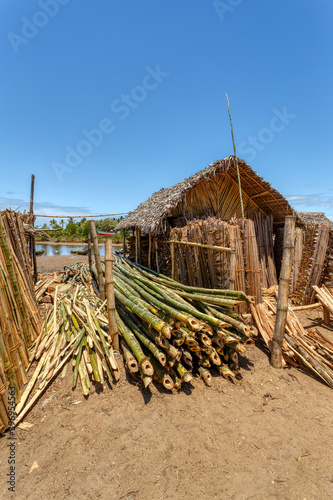 sale of firewood on street marketplace in Maroantsetra city, Madagascar. Madagascar has lost more than 90% of its original forest