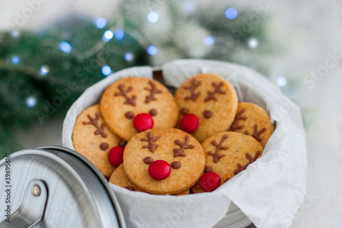 Rudolph's Christmas cookies in a metal jar with the inscription "Cookie", selective focus