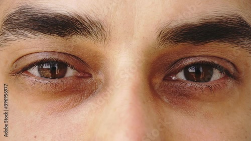 Close up of man's brown eyes 
