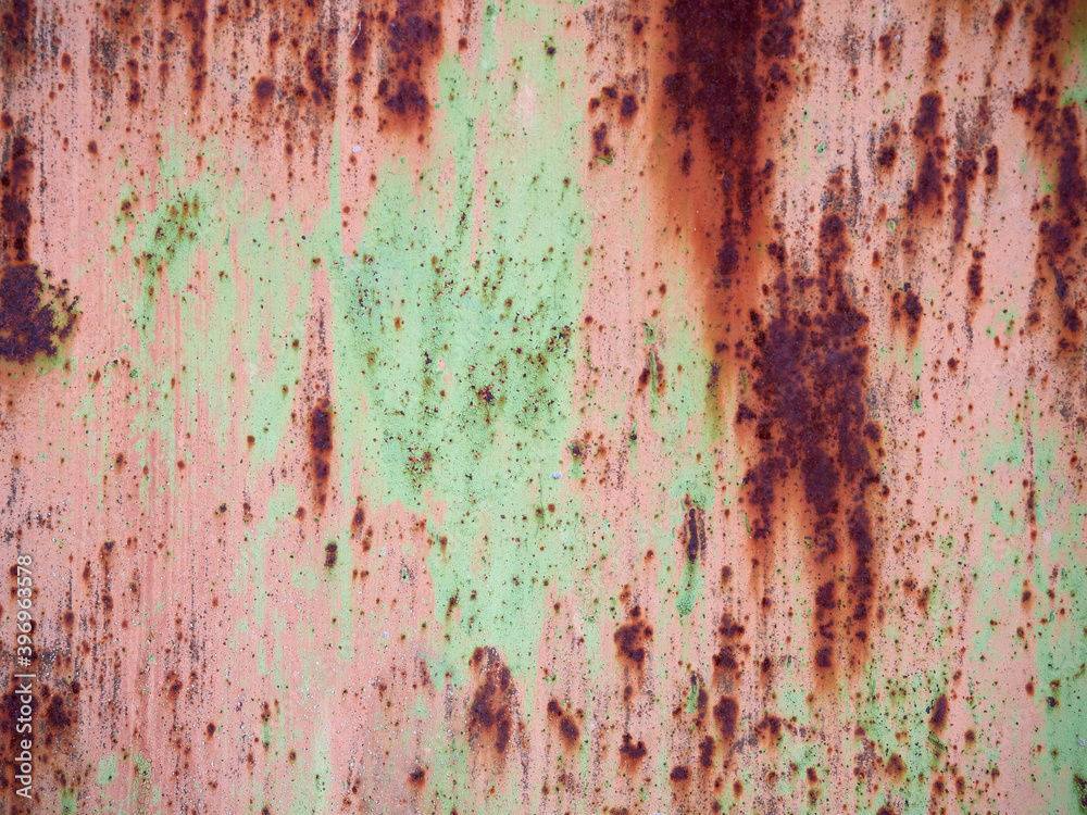 Fototapeta premium Rust.Old blue painted wall with rust spots.Textured rusty metal background. Rust stains through the cracked blue paint.