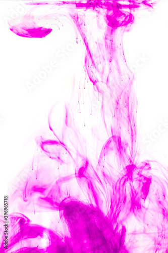 stains from pink powder in water as background