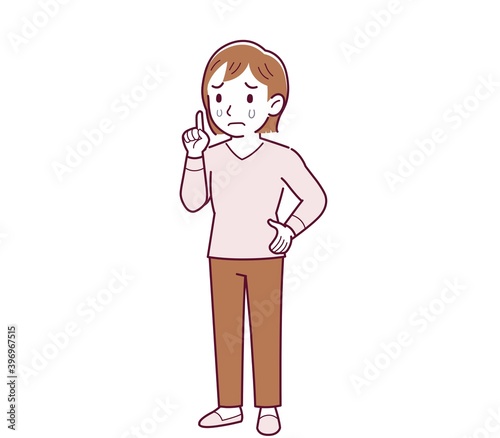 ピンクの長袖の若い女性