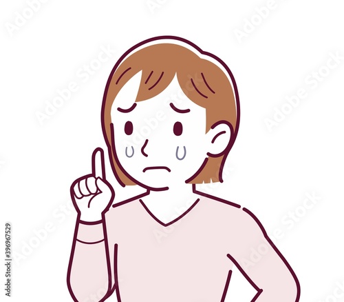 ピンクの長袖の若い女性