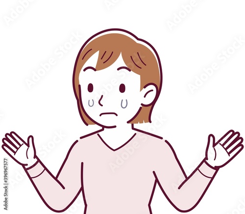 ピンクの長袖の若い女性