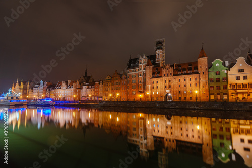 Wonderful night view of Gdansk with reflection of houses in the water 