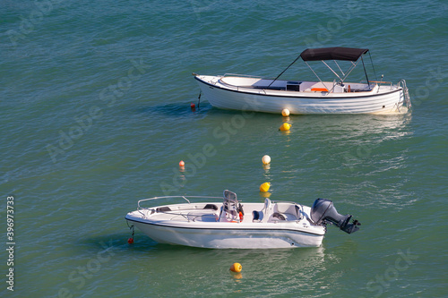 Two pleasure motor boats are anchored © evannovostro