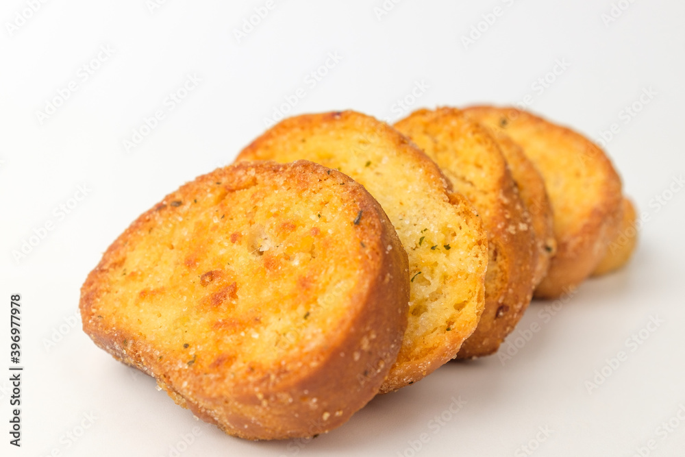 Garlic bread on a white background Garlic bread on a white background