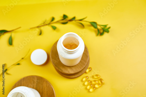 Alternative medicine herbal organic capsule with vitamin E, omega three fish oil