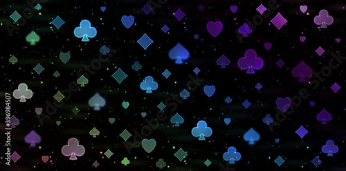 Colorful poker abstract bokeh pattern on a black background.