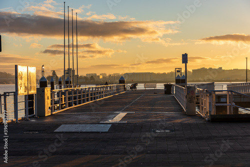 Kiel, Blick über die Kieler Förde auf den Ostuferhafen und die Schwentinemündung krz nach Sonnenaufgang photo