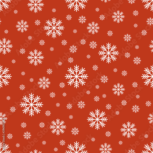 The seamless pattern with the white snowflakes on the red background. The save with the Clipping Mask.