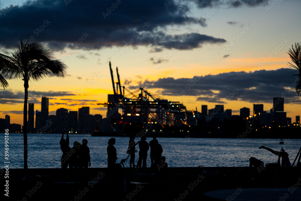 Miami Beach tourists watching the sunset