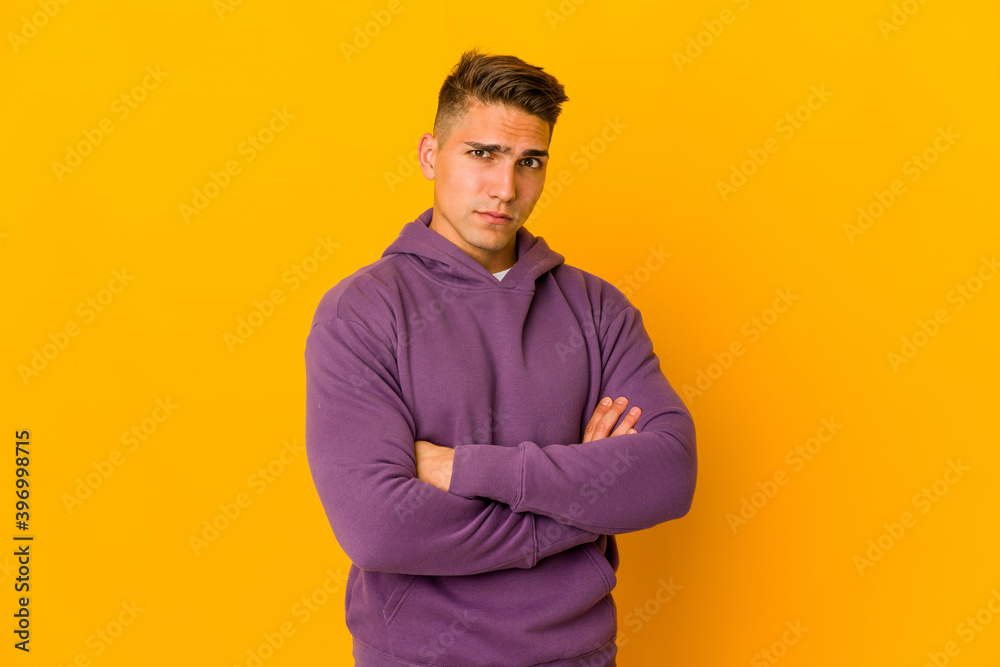 Young handsome caucasian man isolated unhappy looking in camera with sarcastic expression. Young handsome caucasian man isolated unhappy looking in camera with sarcastic expression.