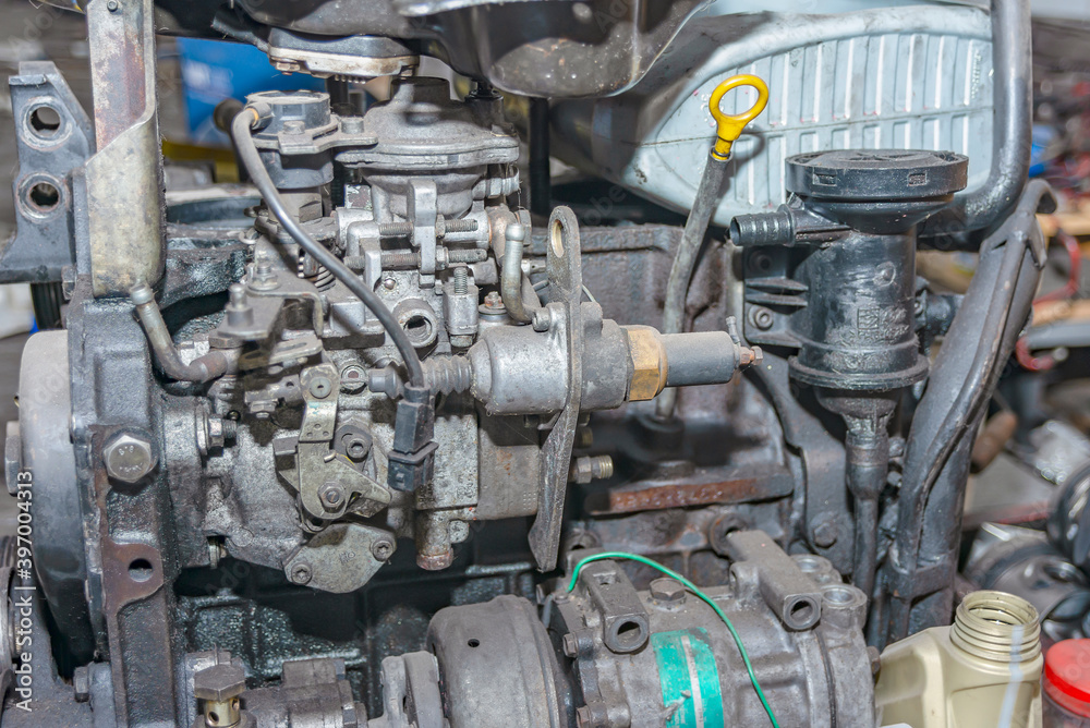 The disassembled engine from the car lies on a hundred, close-up. The disassembled engine from the car lies on a hundred, close-up.