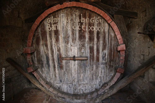 the monumental Barrel of the Canons in the city of Gubbio. The capacity, equivalent to 20124 liters, is written on the front of the barrel in the ancient local language