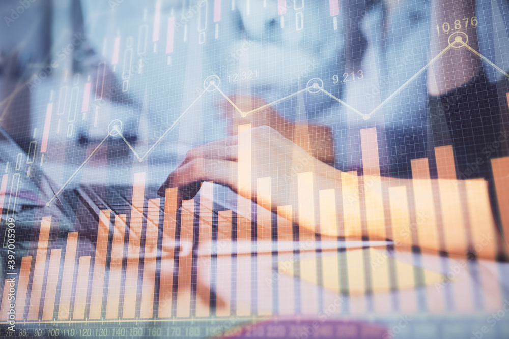 Multi exposure of woman hands typing on computer and financial graph hologram drawing. Stock market analysis concept. Multi exposure of woman hands typing on computer and financial graph hologram drawing. Stock market analysis concept.