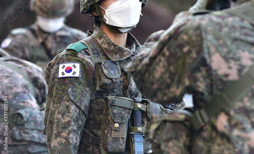 Korean Army Soldier wearing a Mask for Coronavirus. photo