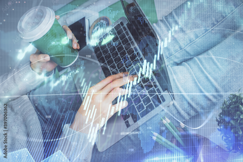 Double exposure of woman hands typing on computer and forex chart hologram drawing. Stock market invest concept. Double exposure of woman hands typing on computer and forex chart hologram drawing. Stock market invest concept.