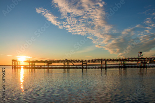 Sunset at Mining pier known as the Tinto Dock  at sunset  Muelle del Tinto . This is one of the remains left by the English in Huelva.