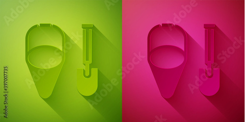 Paper cut Fire shovel and cone bucket icon isolated on green and pink background. Paper art style. Vector.