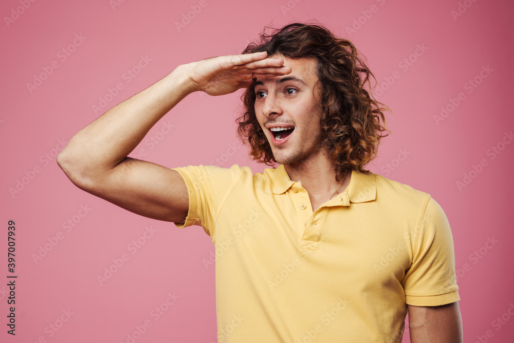 Surprised handsome caucasian guy posing and looking aside Surprised handsome caucasian guy posing and looking aside