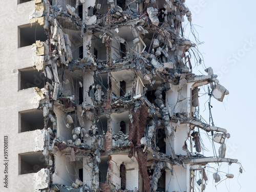 Fototapeta complete demolition destruction of a tall building completely ruined tall buildi