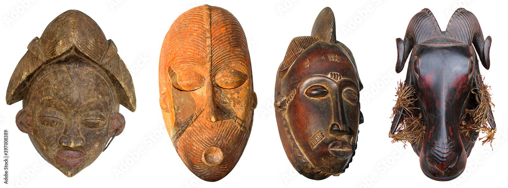 Original, handmade African sculptures and masks, isolated on white background