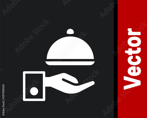 White Covered with a tray of food icon isolated on black background. Tray and lid sign. Restaurant cloche with lid. Vector.