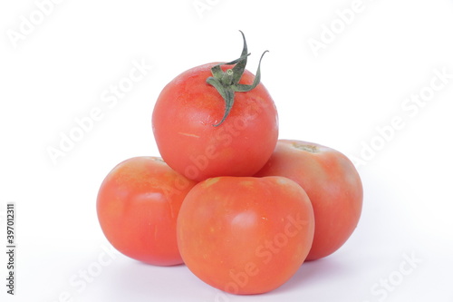 Fresh Vegetable Onion Tomato Ginger Garlic green chilly on white background photo