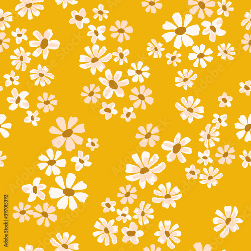 Daisy floral seamless vector pattern in yellow and pink. Ditsy spring background. Small flowers print for textile, home decor, wallpaper, gift wrap.