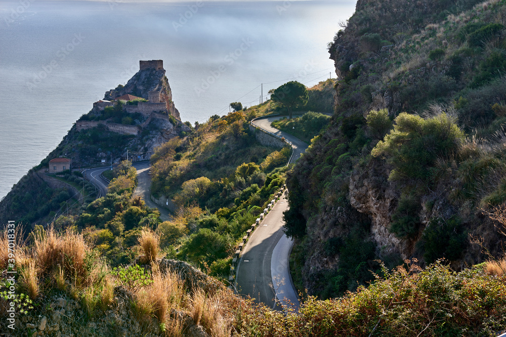 The streets leading to the medieval castle of Sant 'Alessio SIculo, in the province of Messina, overlooking the sea and in the first minutes of sunshine in the morning