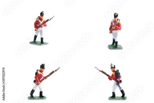 4 in 1 shot of metal soldiers with musket on the white background photo