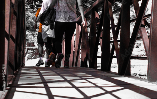 people walking on bridge