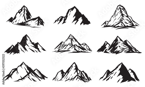 Set of silhouette mountains in grayscale sketch hand drawn style isolated on white background. Design element for print, cover, banner. Vector illustration.
