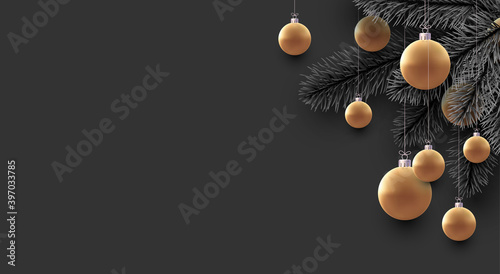 Realistic Xmas golden baubles and spruce branches.