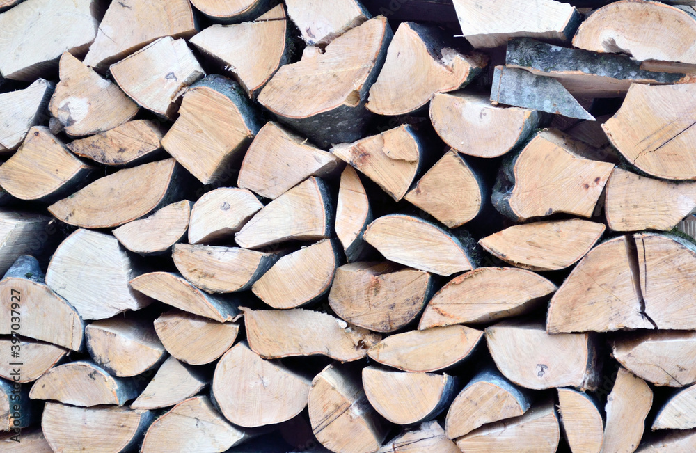 Woodpile made of sawn wood, background Woodpile made of sawn wood, background