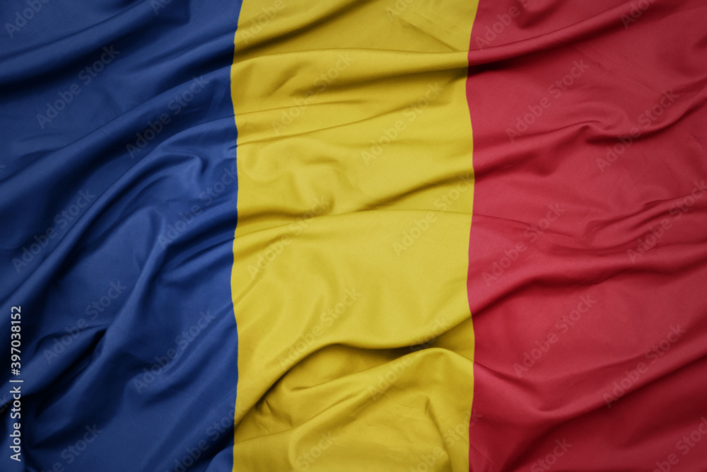 waving colorful national flag of romania.