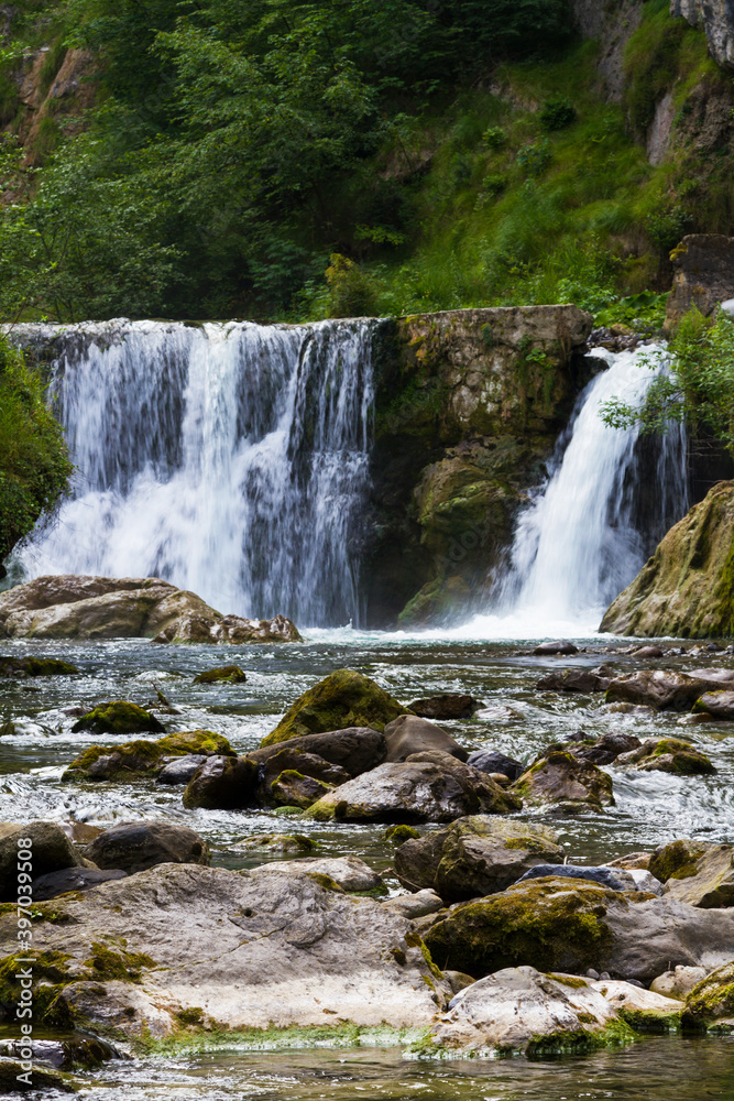 Waterfall on Alps in summer time, Brembana valley