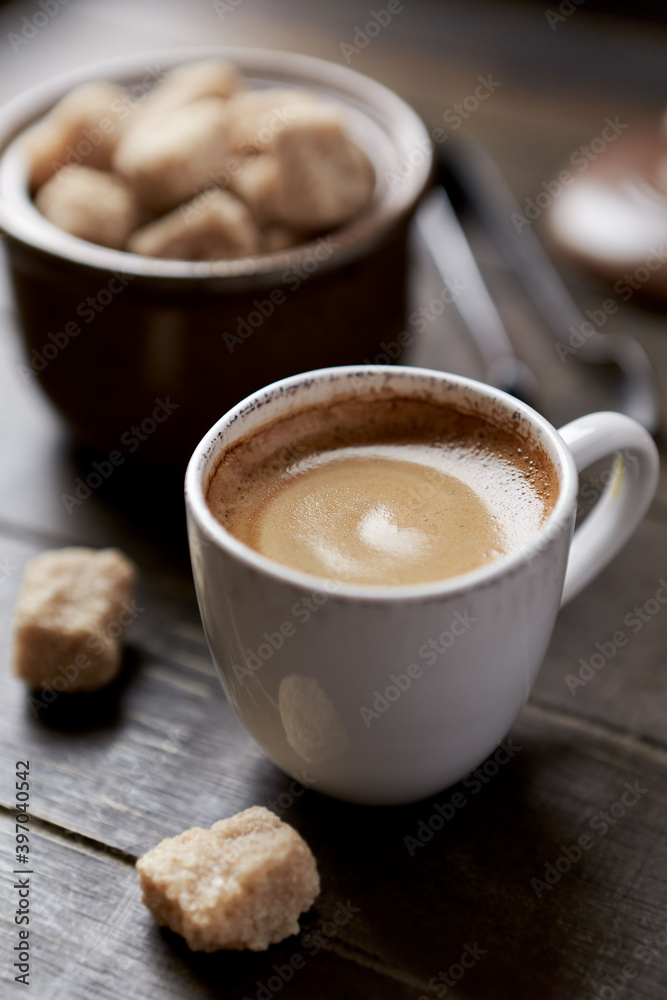 Cup of coffee on rustic wooden background. Close up. Cup of coffee on rustic wooden background. Close up.