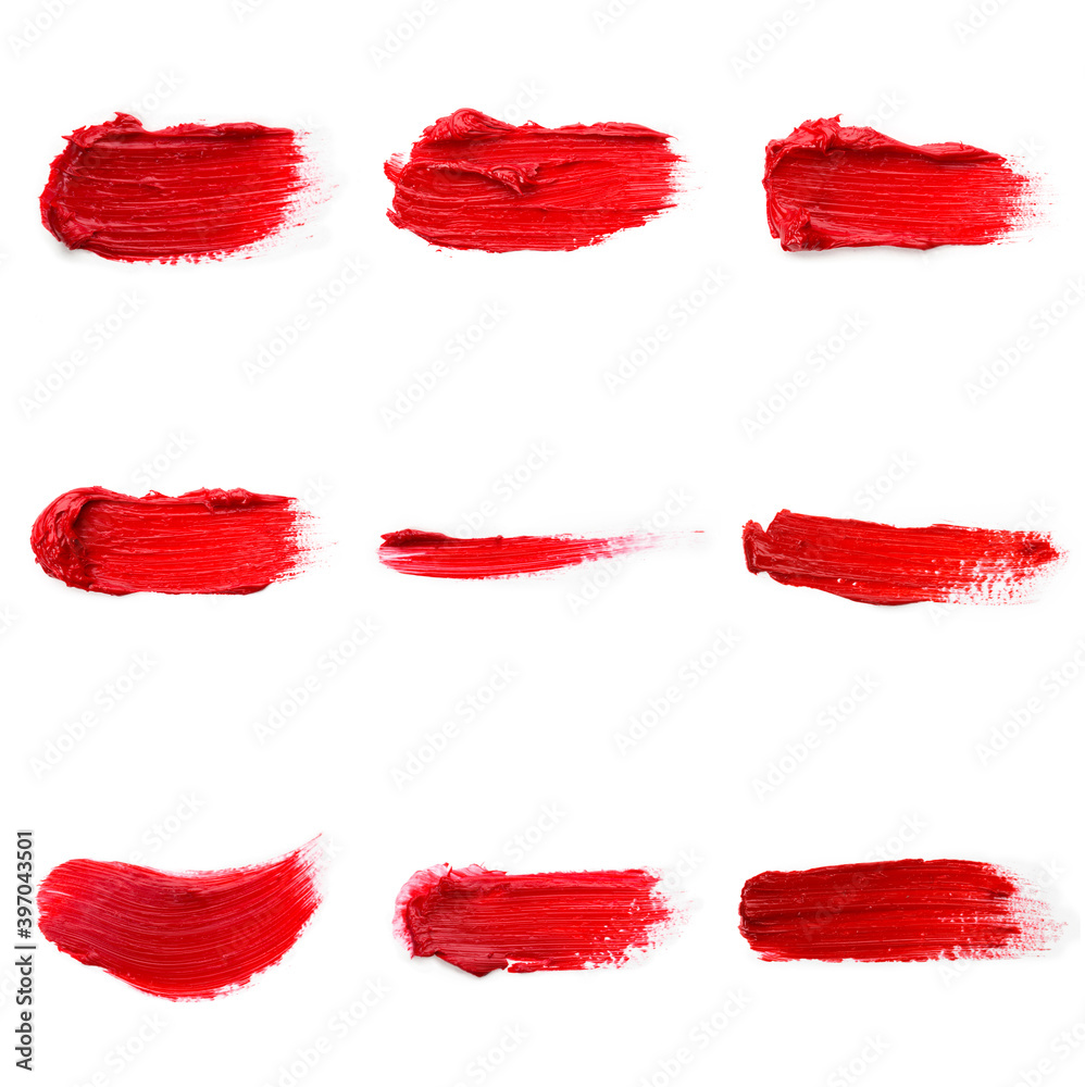 Lipstick smear smudge swatch isolated on white background. Cream makeup texture. Bright red color cosmetic product brush stroke swipe sample Lipstick smear smudge swatch isolated on white background. Cream makeup texture. Bright red color cosmetic product brush stroke swipe sample