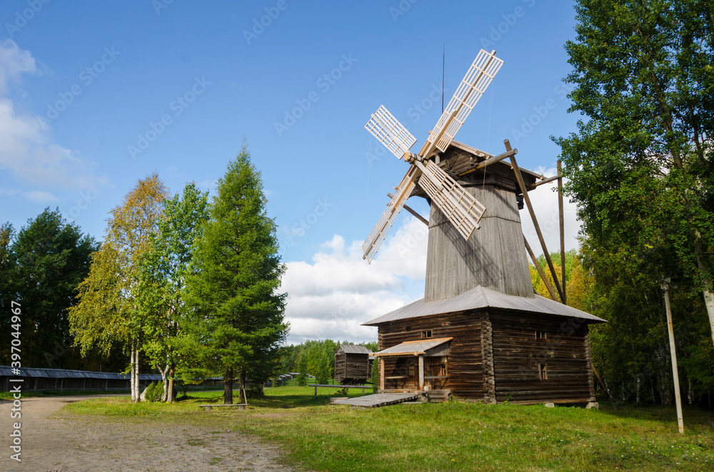 Windmill with wooden wings. Dutch type mill
