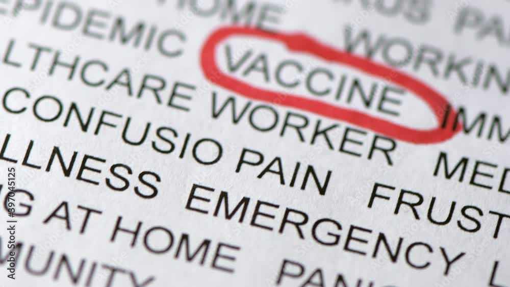 The encircled vaccine word on the news print. Vaccine The encircled vaccine word on the news print. Vaccine