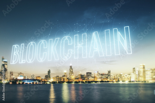 Double exposure of abstract virtual blockchain technology hologram on Chicago city skyscrapers background. Research and development decentralization software concept