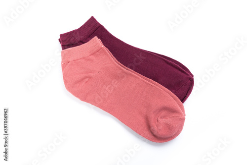 two pairs of colored short socks on a white background, top view