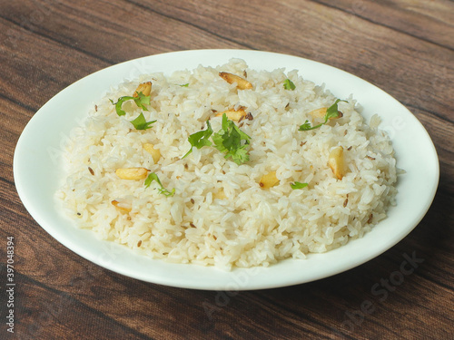 Cumin rice or Jeera Rice is a popular Indian main course item made using Basmati rice flavored with fried cumin seeds and basic spices, selective focus