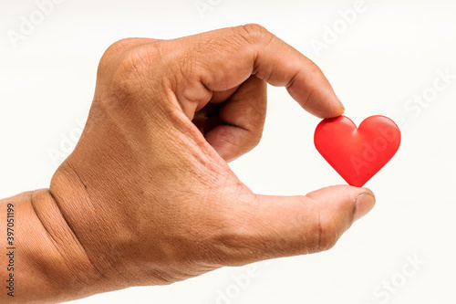 Little Heart in hand of old man. heart disease  Heart Disease Prevention  Health care 