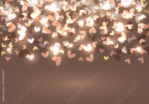 Heart background or card with lights ahd tender elements on shampagne background on St Valentines day or wedding photo
